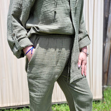Load image into Gallery viewer, muslin-women's-tie-waist-pants-featuring-elasticated-string-tie-waist-and-side-pockets-in-khaki-worn-with-Ada-muslin-hooded-shirt-in-khaki-close-up-view