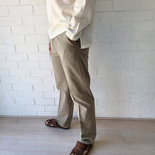 Load image into Gallery viewer, men's-cotton-chino-pants-with-elasticated-waist-at-back-side-pockets-and-buttoned-back-pockets-in-khaki-side-view