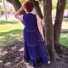 Load image into Gallery viewer, coral-sleeveless-maxi-dress-with-wide-tiered-skirt-with-lace-trim-in-purple-back-view