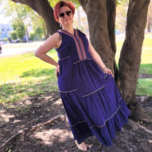 Load image into Gallery viewer, coral-sleeveless-maxi-dress-with-embroidery-detail-on-Vneckline-and-front-bodice-and-wide-tiered-skirt-with-lace-trim-in-purple-front-view