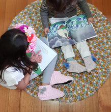 Load image into Gallery viewer, kids-crochet-slipper-boots-in-soft-velvet-yarn-grey-with-blue-pompom-and-pink-with-grey-pompom-on-kids-feet