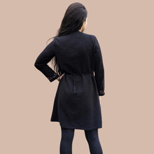 Load image into Gallery viewer, long-sleeve-brushed-cotton-tunic-dress-in-black-with-embroidery-detail-on-sleeve-cuffs-showing-string-tie-waist-back