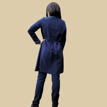 Load image into Gallery viewer, long-sleeve-brushed-cotton-tunic-dress-in-navy-with-embroidery-detail-on-sleeve-cuffs-showing-string-tie-waist-back