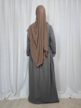 Load image into Gallery viewer, Back view of woman wearing grey maxi dress and beige hijab in front of a white curtain

