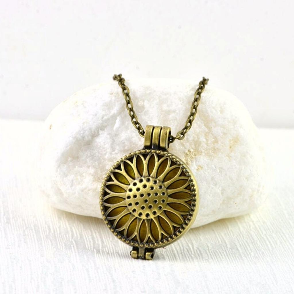 vintage-look-bronze-aromatherapy-essential-oils-diffuser-filigree-style-sunflower-design-pendant-necklace-jewellery-pendant-close-up