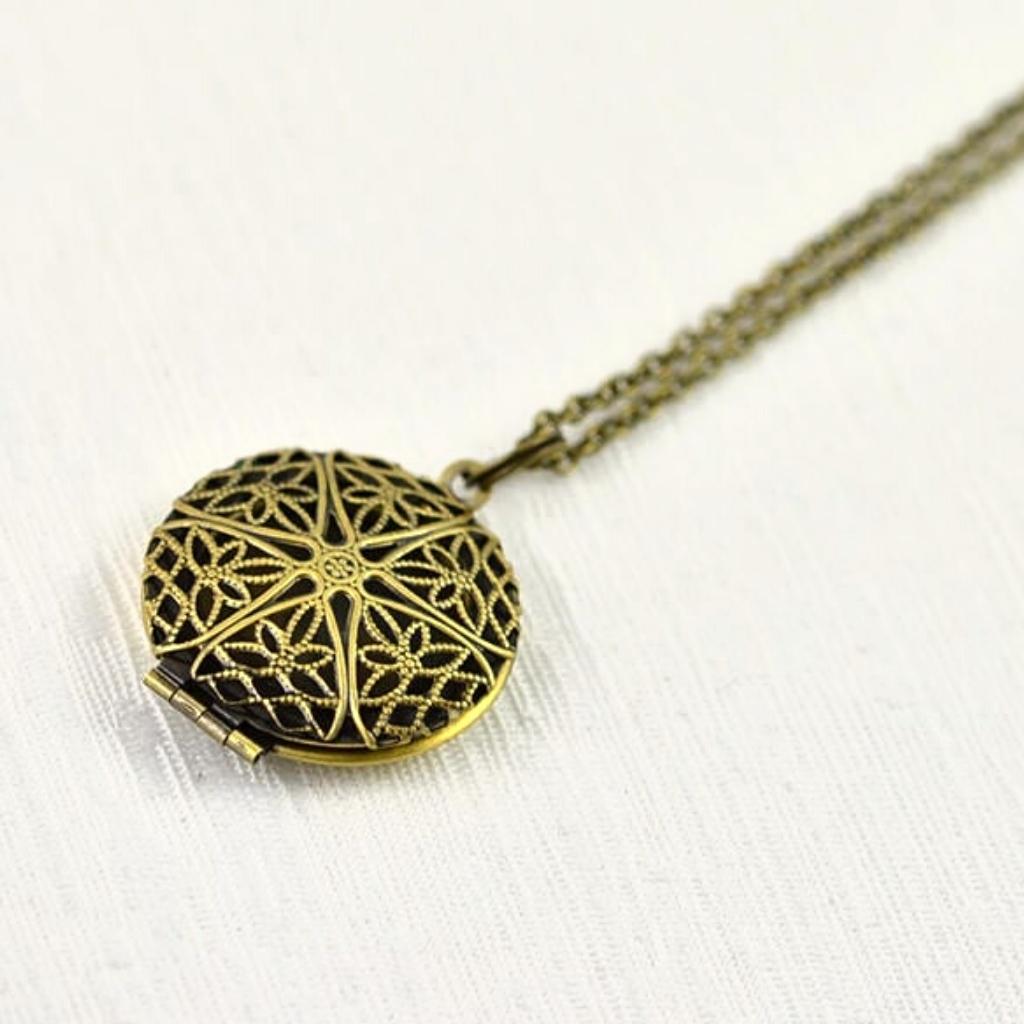 Essential Oil Diffuser Locket Necklace - Bronze Floral Star Filigree